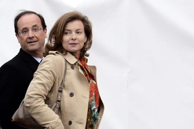 President Francois Hollande's colourful personal life was often in the headlines, with stories of a secret tryst causing a break up with partner Valerie Trierweiler (R)