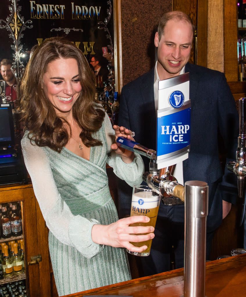 Kate Middleton pouring a pint