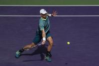 Mar 29, 2018; Key Biscayne, FL, USA; Kevin Anderson of South Africa hits a forehand against Pablo Carreno Busta of Spain (not pictured) on day ten of the Miami Open at Tennis Center at Crandon Park. Mandatory Credit: Geoff Burke-USA TODAY Sports