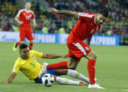 <p>Brazil’s Casemiro, left low, and Serbia’s Aleksandar Mitrovic, right, challenge for the ball during the group E match between Serbia and Brazil, at the 2018 soccer World Cup in the Spartak Stadium in Moscow, Russia, Wednesday, June 27, 2018. (AP Photo/Victor R. Caivano) </p>