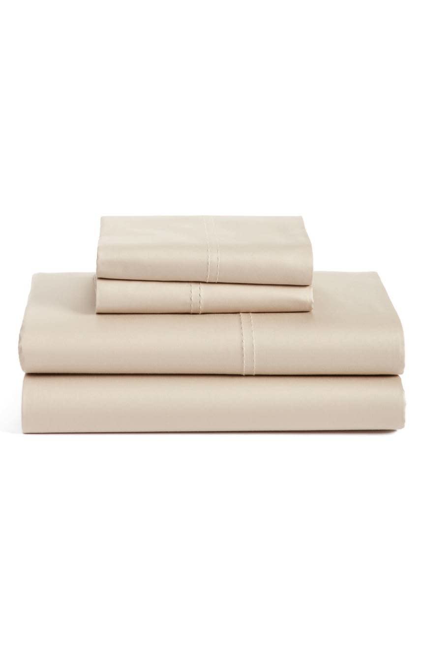 New bedsheets can make a room. This <a href="https://shop.nordstrom.com/s/nordstrom-at-home-400-thread-count-organic-cotton-sateen-sheet-set/4817634?contextualcategoryid=2375500&amp;origin=keywordsearch&amp;keyword=wedding+gift&amp;top=72" target="_blank">400 thread count organic cotton sateen sheet set</a>&nbsp;is on-sale for under $100, so snag it now to give the gift of luxe without breaking the bank.