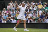 Tunisia's Ons Jabeur celebrates winning a point against Germany's Tatjana Maria in a women's singles semifinal match on day eleven of the Wimbledon tennis championships in London, Thursday, July 7, 2022. (AP Photo/Kirsty Wigglesworth)