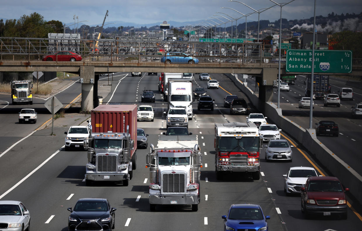 BERKELEY, CALIFORNIA - MAY 02: Diesel trucks drive along Interstate 80 on May 02, 2022 in Berkeley, California. The price of diesel has reached an all-time high in the U.S. and is causing trouble in the trucking industry. The average price of diesel is at $5.296 per gallon. (Photo by Justin Sullivan/Getty Images)