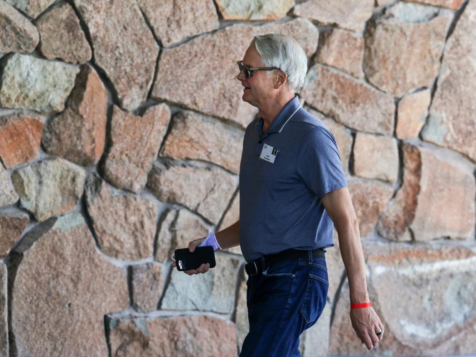 John Donahoe, Nike's CEO, walks into Sun Valley Lodge
