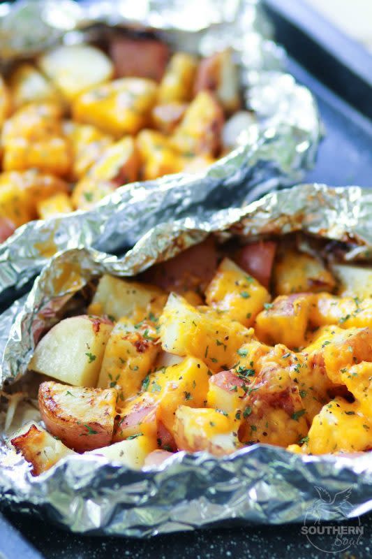 <p>A Southern Soul</p><p>Cheesy red potatoes cooked in foil packs are the perfect side dish for cookouts and BBQs.</p><p><strong>Get the recipe: <a href="https://www.asouthernsoul.com/cheesy-ranch-potato-foil-packs/" rel="nofollow noopener" target="_blank" data-ylk="slk:Cheesy Red Potato Foil Packs;elm:context_link;itc:0;sec:content-canvas" class="link ">Cheesy Red Potato Foil Packs</a></strong></p>