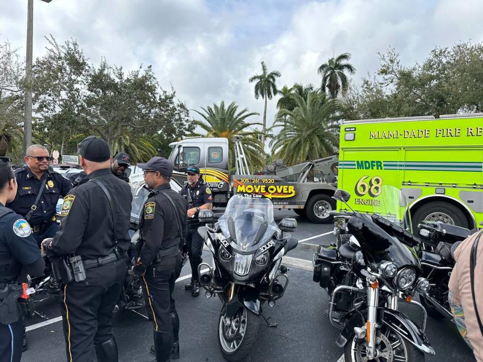 Florida Highway Patrol officers, along with safety partners including the Florida Department of Transportation and Miami-Dade Fire Rescue and other first responders gathered in the parking lot alongside emergency vehicles marked with new Move Over logo at a news conference at FHP Troop E headquarters in Miami as part of Move Over Law awareness month on Jan. 24, 2024.