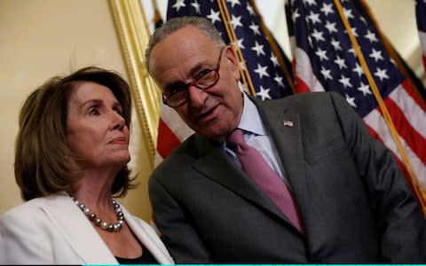 Nancy Pelosi, left, and Chuck Schumer - the most senior Democrats in the House of Representatives and Senate - Credit: Aaron P. Bernstein/Getty Images