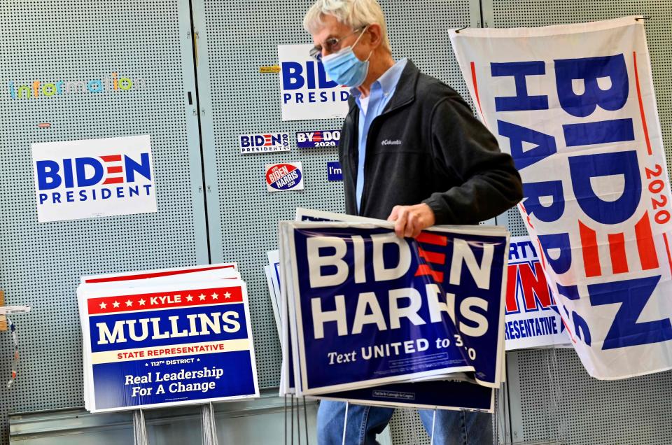 A supporter of Democratic presidential nominee Joe Biden and his vice presidential running mate, Sen. Kamala Harris of California, made a donation at the Lackawanna County Democratic Committee headquarters on Sept. 30 in Peckville, Pa.