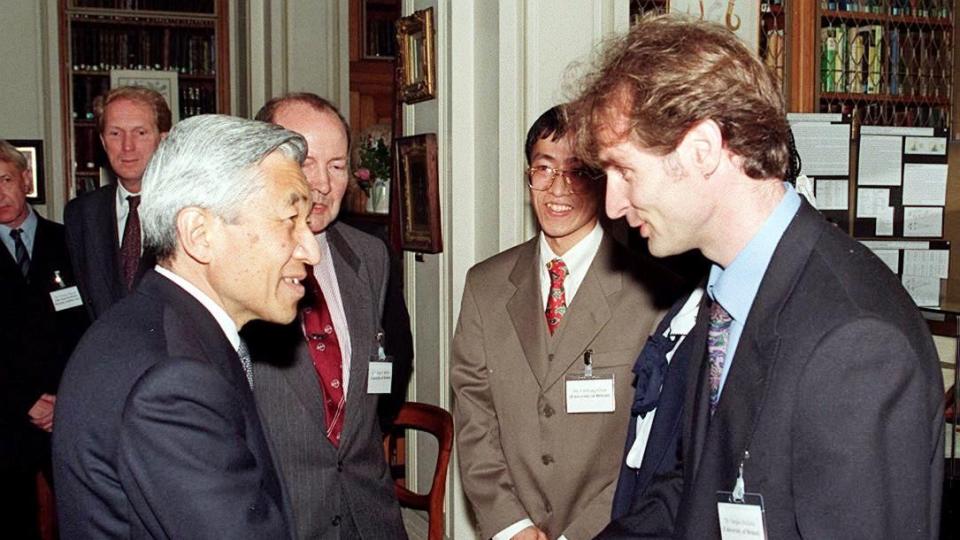 japanese emperor akihito l shakes hands with dr