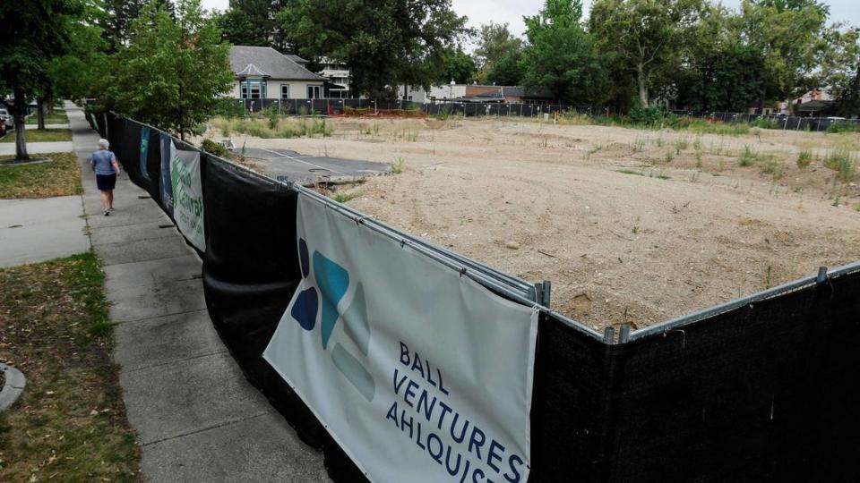 Construction is paused on Ball Ventures Ahlquist’s 13-story office and apartment project planned at North 4th and West Idaho streets. The dirt lot sits empty.