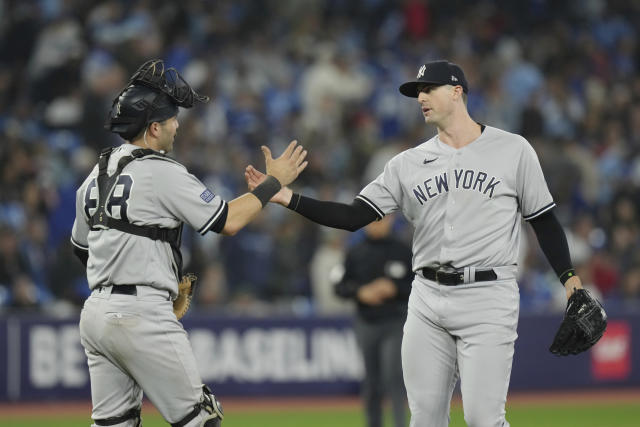 New York Yankees catcher Austin Wells and relief pitcher Clay