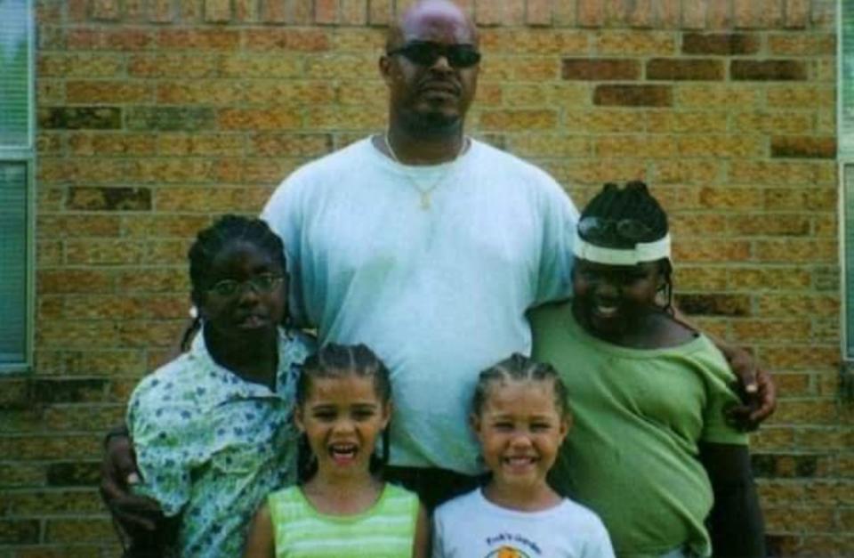 A 9-year-old Mauree Turner, left, with her siblings and father in 2002, outside Redemption church, a program where families could spend time with a family member transitioning back into life outside of prison.  (Photo: Courtesy of Mauree Turner)