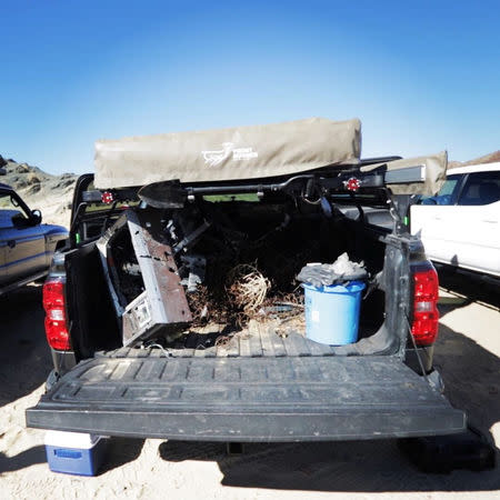 Trash is seen on the bed of a truck near Joshua Tree National Park in California, January 6, 2019, in this picture obtained from social media. @lost.sasquatch/via REUTERS