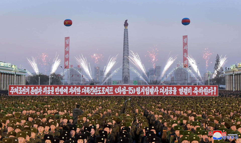 This picture released by North Korea's official Korean Central News Agency on Dec. 2, 2017 shows North Korean soldiers and residents holding a rally in Pyongyang.