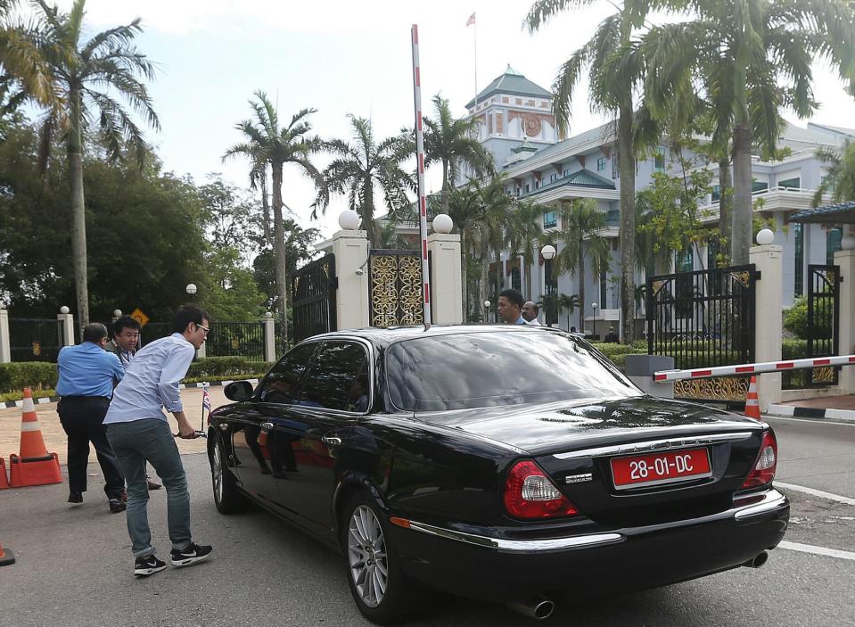 North Korean ambassador to Malaysia's car enters Malaysian Foreign Ministry in Putrajaya, Malaysia, Monday, Feb. 20, 2017. Since the death of Kim Jong Nam, the North Korean ruler's outcast half brother, last week, authorities have been trying to piece together details of what appeared to be an assassination. (AP Photo) MALAYSIA OUT