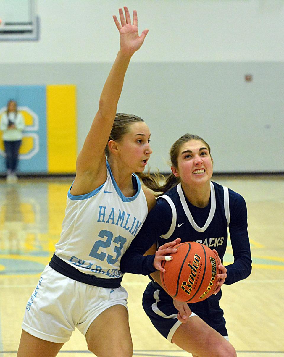 Sioux Valley's Isabelle Bloker is hounded by Hamlin's Marissa Bawdon (23) during their high school girls basketball game on Monday, Feb. 5, 2024 at the Hamlin Education Center.