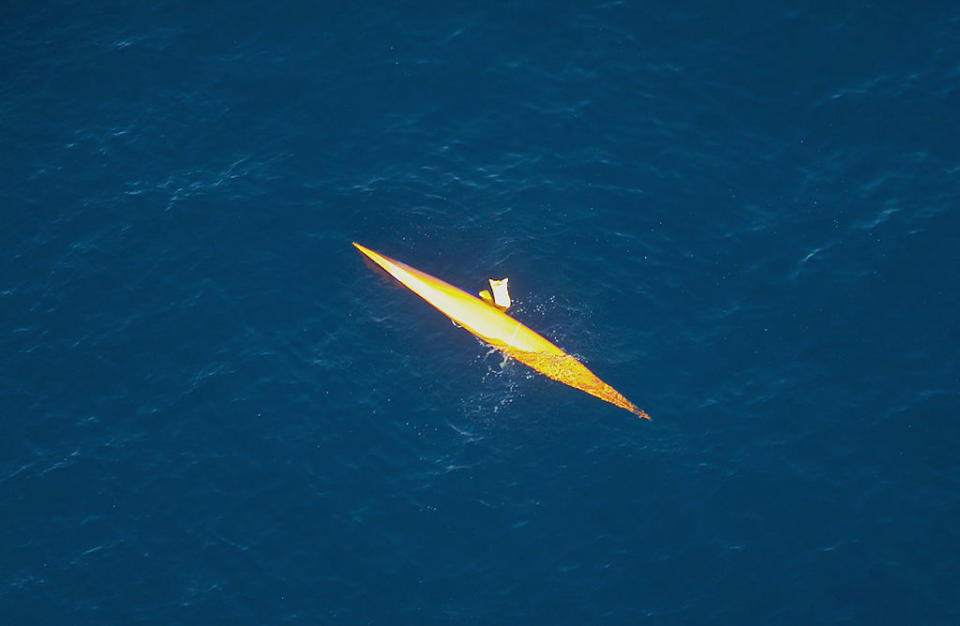 andrew's turned over kayak out at sea