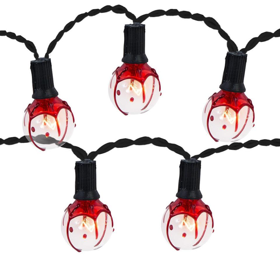 <p>These aren’t your run-of-the-mill twinkle lights, that’s for sure.</p> <p><strong>Shop now:</strong> Bloody Globe String Lights, $15. <a rel="nofollow noopener" href="https://www.partycity.com/bloody-globe-string-lights-688076.html?cgid=creepy-carnival-halloween-party-supplies" target="_blank" data-ylk="slk:partycity.com;elm:context_link;itc:0;sec:content-canvas" class="link ">partycity.com</a></p>