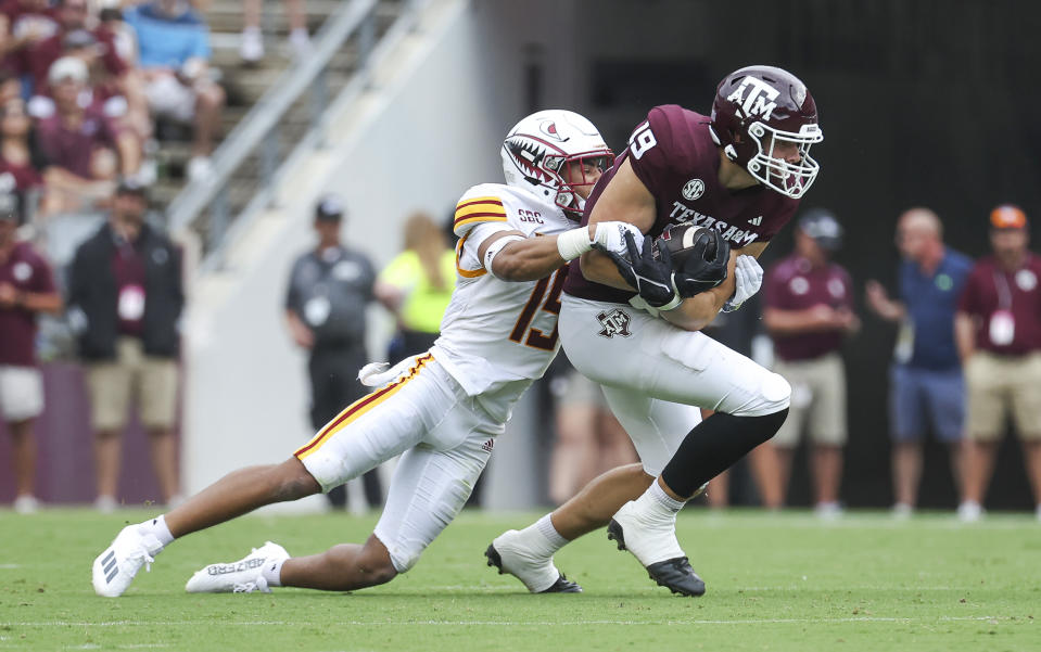 Sep 16, 2023; College Station, Texas; Texas A&M Aggies tight end Jake Johnson (19) makes a reception as Louisiana Monroe Warhawks safety Simion Hines (15) attempts to make a tackle during the first quarter at Kyle Field. Troy Taormina-USA TODAY Sports