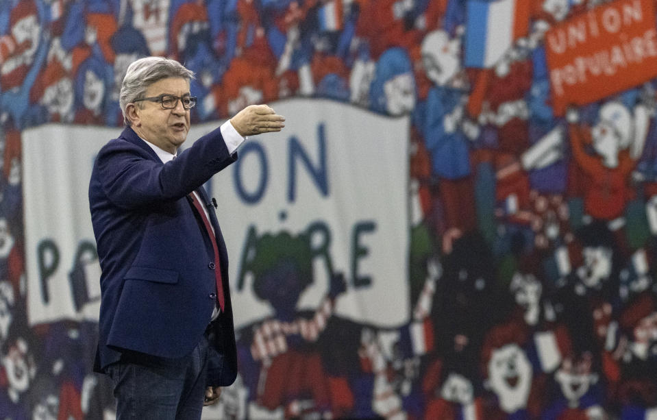 French Far-left presidential candidate for the 2022 election Jean-Luc Melenchon gestures as he speaks during a meeting in Nantes, western France, Sunday, Jan. 16, 2022. Far-left French presidential candidate Jean-Luc Melenchon sought Sunday to reinvigorate his flagging campaign for April's election with an "immersive and olfactory" rally, using 360-degree video and smells diffused through an exhibition hall in the western city of Nantes. (AP Photo/Jeremias Gonzalez)