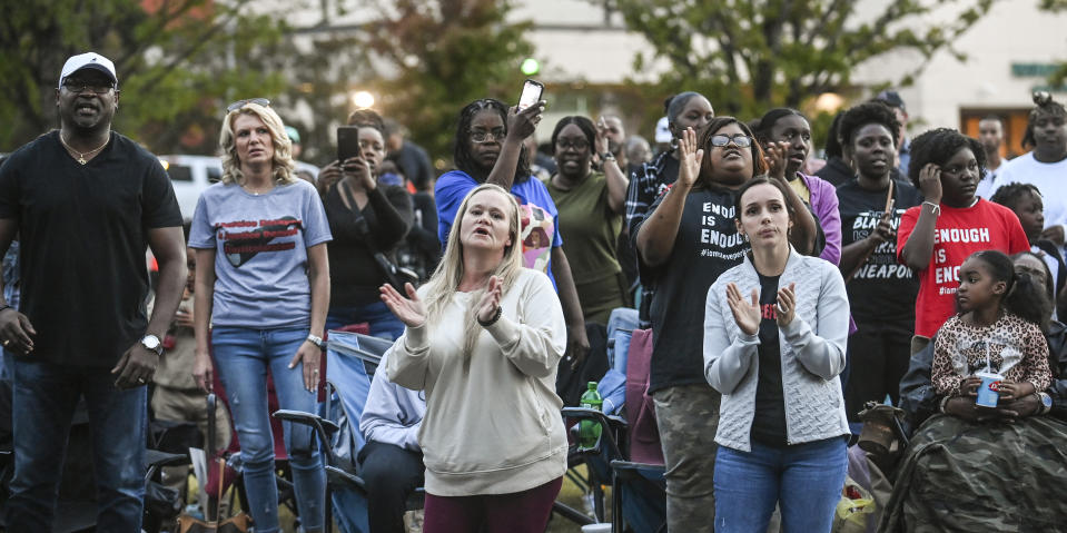 People attending a revival for Steve Perkins in Decatur, Ala. pray and sing during the event on Tuesday, Oct. 10, 2023 in Decatur, Ala. Steve Perkins, 39, was killed by police Sept. 29 in Decatur in a confrontation that began with a tow truck driver trying to repossess Perkins’ truck.(Jeronimo Nisa/The Decatur Daily via AP)