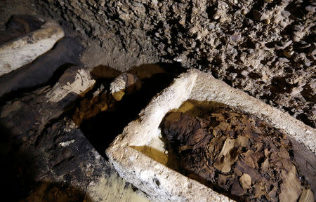 Mummies are seen inside a tomb during the presentation of a new discovery at Tuna el-Gebel archaeological site in Minya Governorate, Egypt, February 2, 2019. REUTERS/Amr Abdallah Dalsh