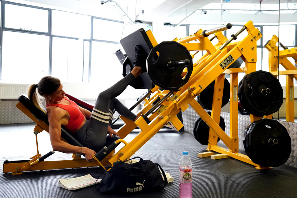 Gym members work out at Ultimate Fitness Gym.