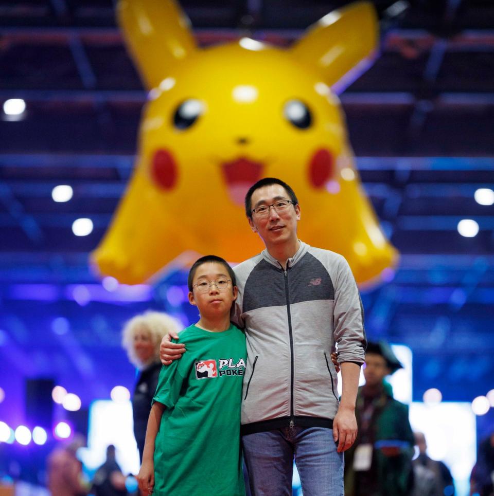 Drake Zhu, 11, and his father Joe