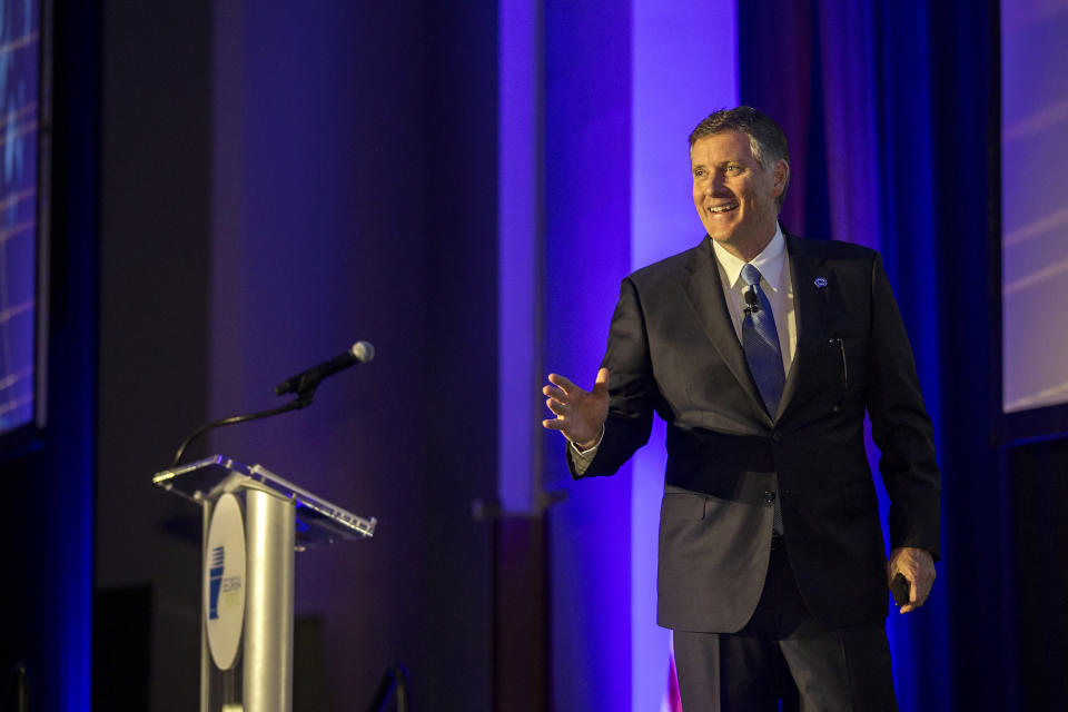 In this photo provided by the Georgia Ports Authority, Griff Lynch, President and CEO of the Georgia Ports Authority, provides an update on the Port of Savannah's progress and future trajectory to 1,200 leaders from the maritime, supply chain, business and political sectors Thursday, Oct. 12, 2023, during the annual State of the Port event in Savannah, Ga. (Stephen B. Morton/Georgia Ports Authority via AP)