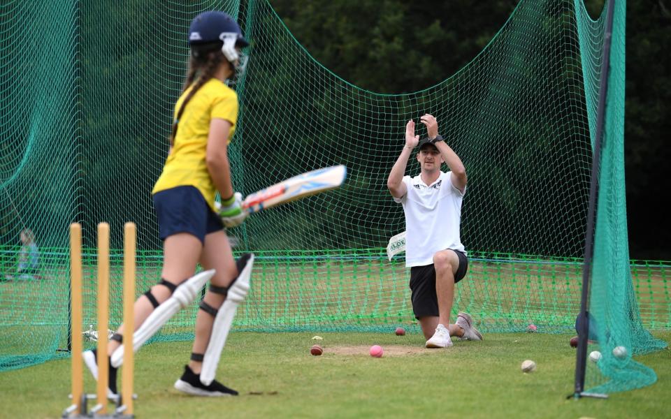 Former Kent cricketer Callum Jackson coaches during a juniors training session at Roehampton Cricket Club on June 27, 2020