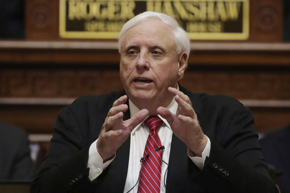FILE - In this Jan. 8, 2020, file photo, West Virginia Gov. Jim Justice delivers his annual State of the State address in the House Chambers at the state capitol in Charleston, W.Va. Justice said Thursday, July 2, 2020, that residents should prepare for a mandatory face mask order as the state’s new coronavirus cases rise to their highest level since the pandemic began. (AP Photo/Chris Jackson, File)