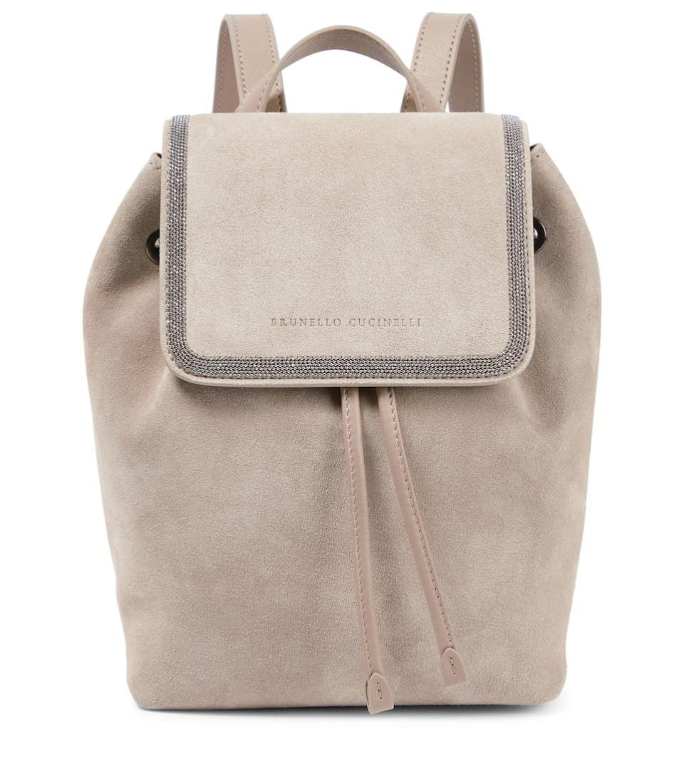 <p><strong>Brunello Cucinelli</strong></p><p>mytheresa.com</p><p><strong>$1637.00</strong></p><p><a href="https://go.redirectingat.com?id=74968X1596630&url=https%3A%2F%2Fwww.mytheresa.com%2Fen-us%2Fbrunello-cucinelli-embellished-suede-backpack-2513945.html&sref=https%3A%2F%2Fwww.harpersbazaar.com%2Ffashion%2Ftrends%2Fg7414%2Fdesigner-backpacks%2F" rel="nofollow noopener" target="_blank" data-ylk="slk:Shop Now;elm:context_link;itc:0;sec:content-canvas" class="link ">Shop Now</a></p>