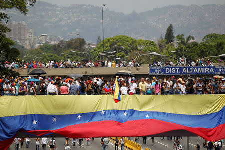 Opposition supporters attend a rally against Venezuela's President Nicolas Maduro in Caracas, Venezuela April 24, 2017. REUTERS/Christian Veron