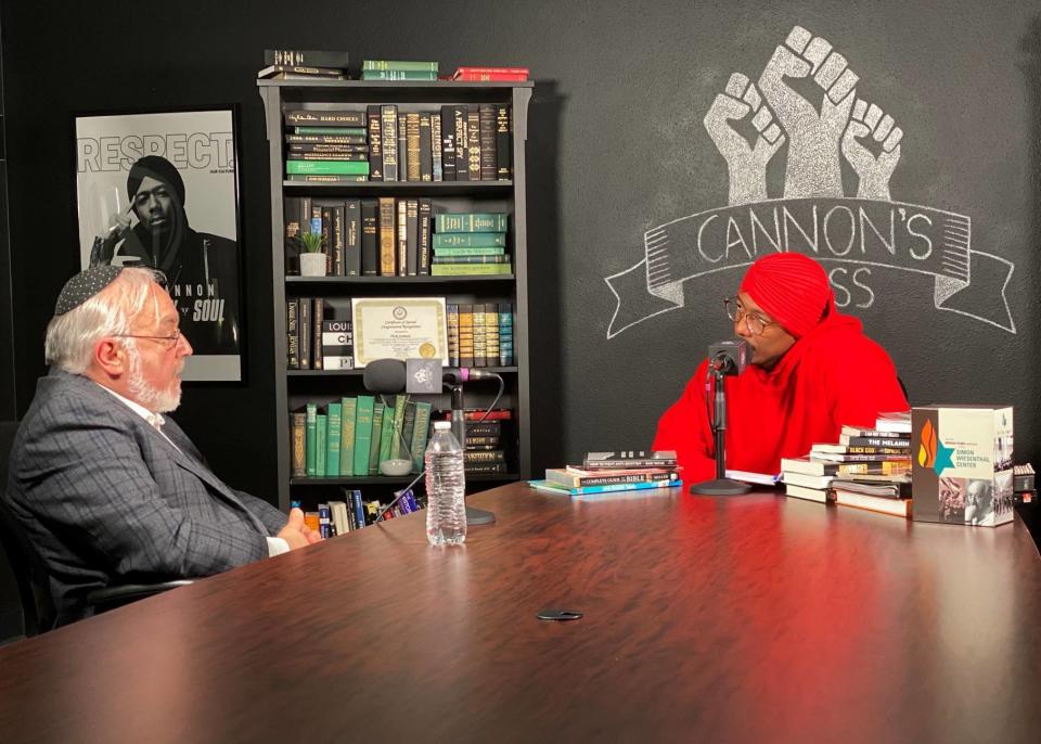 This image provided by Rabbi Abraham Cooper shows Cooper, left, and Nick Cannon during a conversation on Thursday, July 17, 2020, in Burbank, Calif. (Rabbi Abraham Cooper via AP)