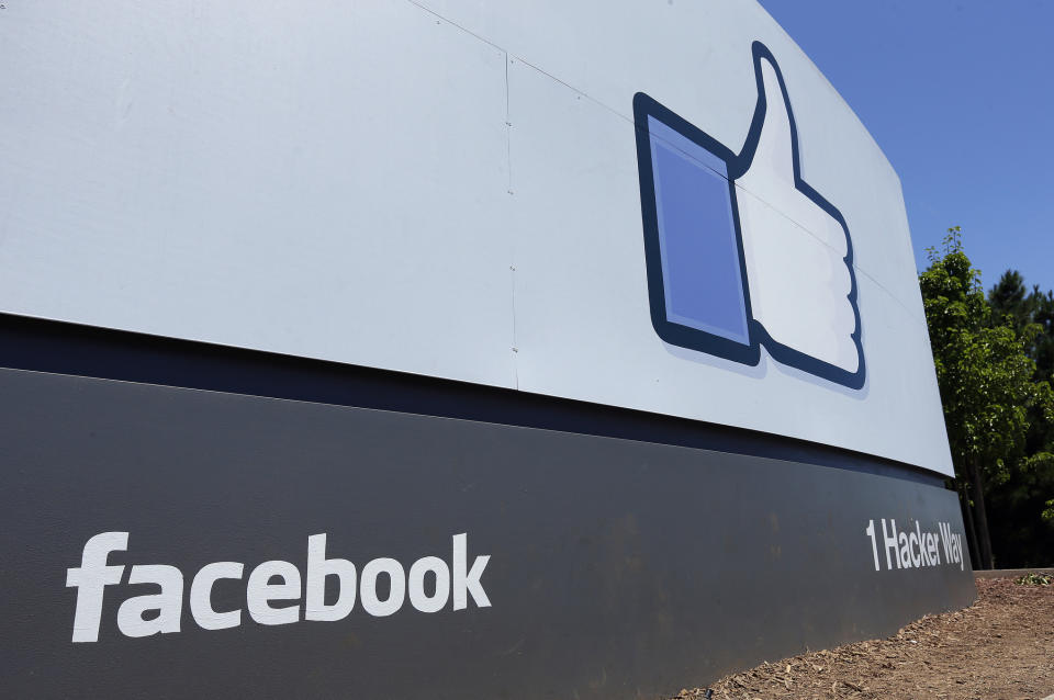 FILE - This July 16, 2013 file photo shows a sign at Facebook headquarters in Menlo Park, Calif. Facebook has more than doubled its New Mexico footprint with the purchase of more than 400 acres near its new data center. (AP Photo/Ben Margot, File)