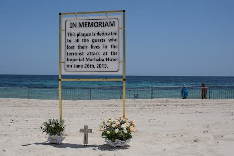 A plaque commemorates the spot where the massacre took place - Credit: GETTY