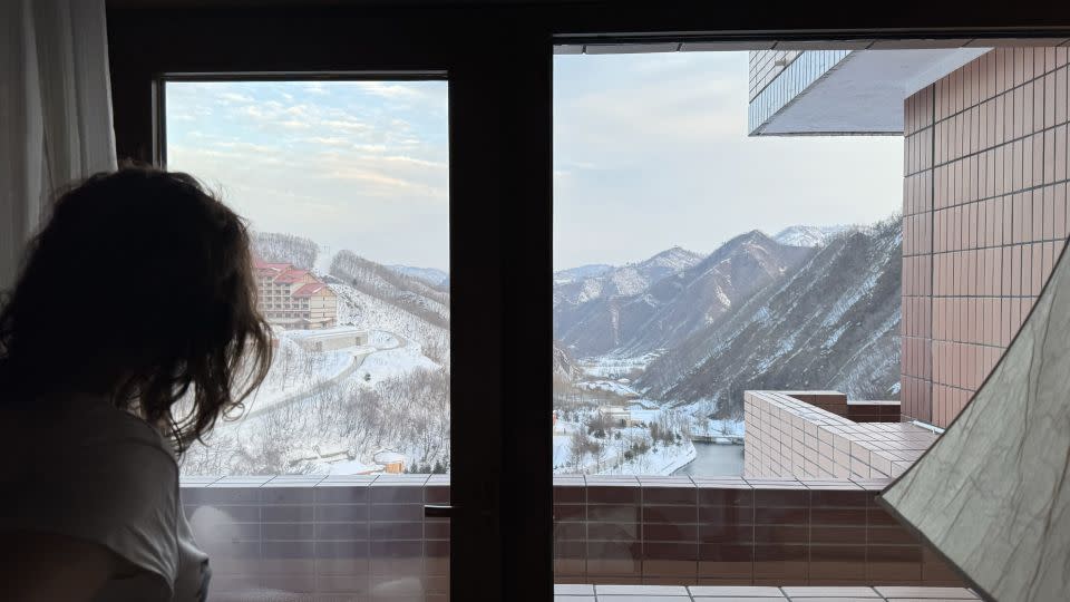 Lena Bychcova looks out the window of her room at Masikryong Ski Resort. - Courtesy Elena Bychcova