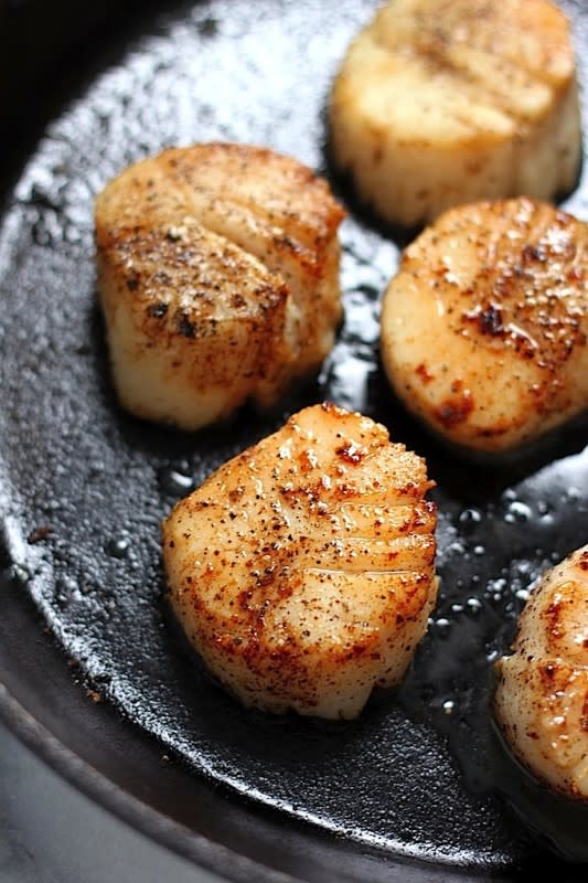<p>Baker by Nature</p><p>Learn how to make perfectly seared scallops with this easy recipe! You only need five simple ingredients to make this impressive recipe.</p><p><strong>Get the recipe: <a href="https://bakerbynature.com/perfectly-seared-scallops/" rel="nofollow noopener" target="_blank" data-ylk="slk:Perfectly Seared Scallops;elm:context_link;itc:0;sec:content-canvas" class="link ">Perfectly Seared Scallops</a></strong></p>