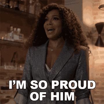 Woman saying "I'm so proud of him"