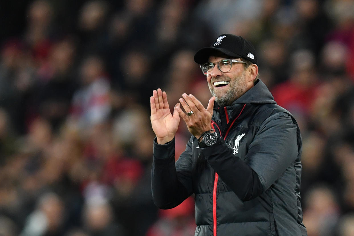 Liverpool's German manager Jurgen Klopp celebrates after winning the English Premier League football match between Liverpool and Tottenham Hotspur at Anfield in Liverpool, north west England on October 27, 2019. (Photo by Paul ELLIS / AFP) / RESTRICTED TO EDITORIAL USE. No use with unauthorized audio, video, data, fixture lists, club/league logos or 'live' services. Online in-match use limited to 120 images. An additional 40 images may be used in extra time. No video emulation. Social media in-match use limited to 120 images. An additional 40 images may be used in extra time. No use in betting publications, games or single club/league/player publications. /  (Photo by PAUL ELLIS/AFP via Getty Images)