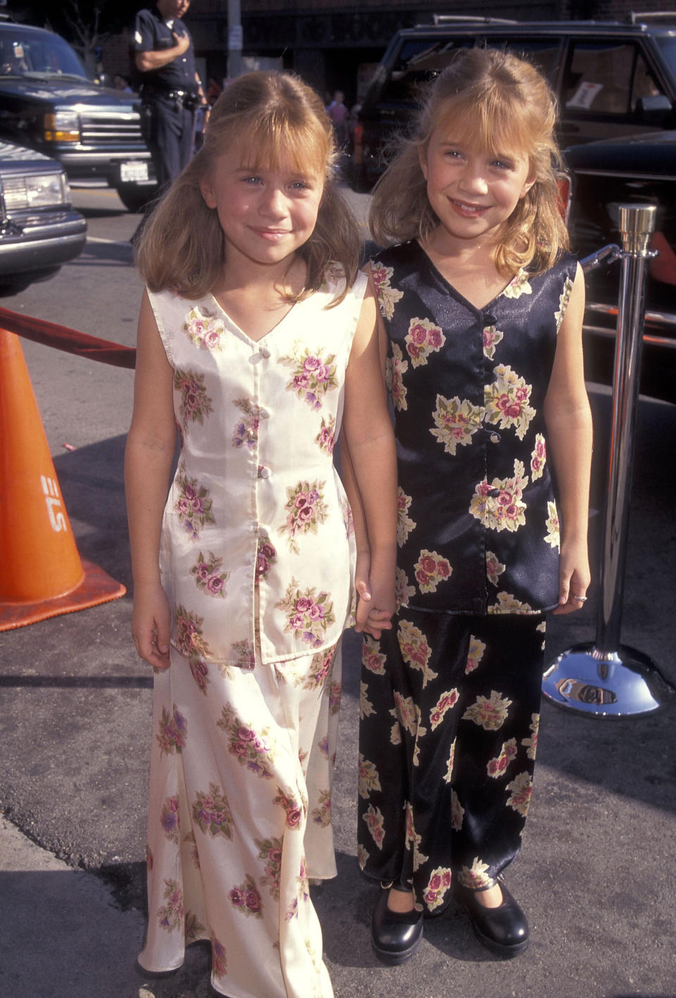 The twins attend the "It Takes Two" premiere at the Mann National Theatre in Westwood, California.