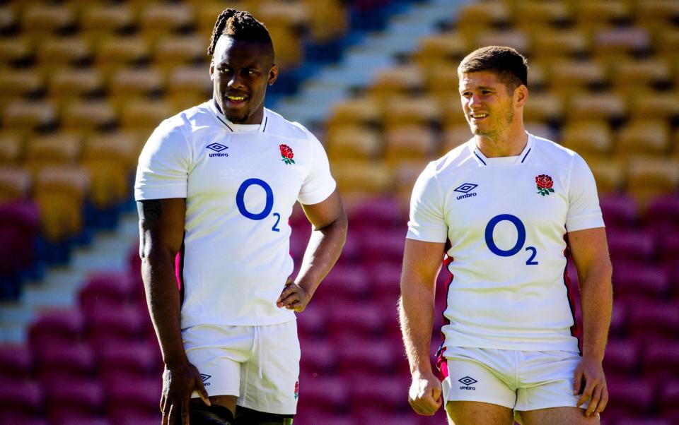 England players Owen Farrell (R) and Maro Itoje look on during England's captain's run at Suncorp Stadium in Brisbane on July 08, 2022