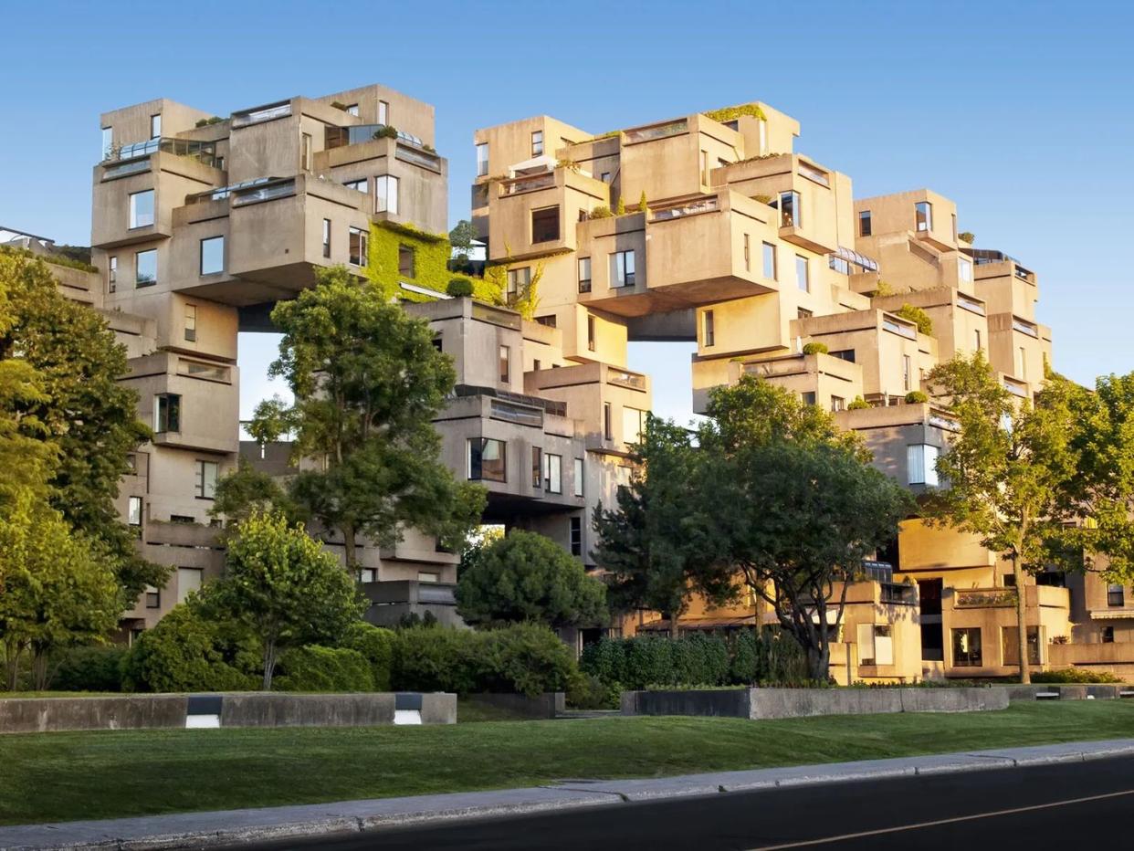 habitat 67 with trees and grass