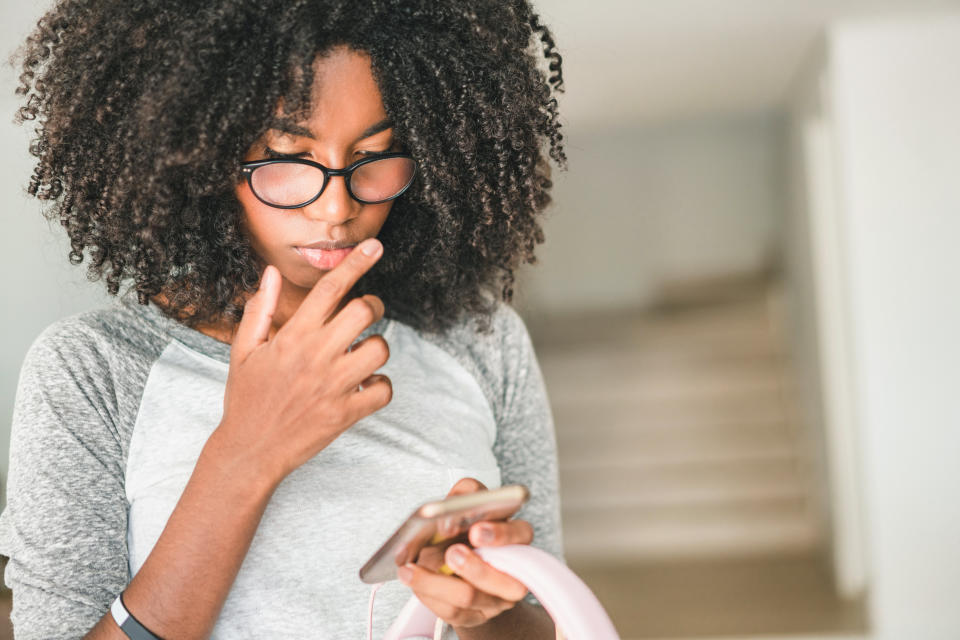 The first step to cutting back on your smartphone use is to determine how much time you're actually spending on your phone. (Photo: Pollyana Ventura via Getty Images)