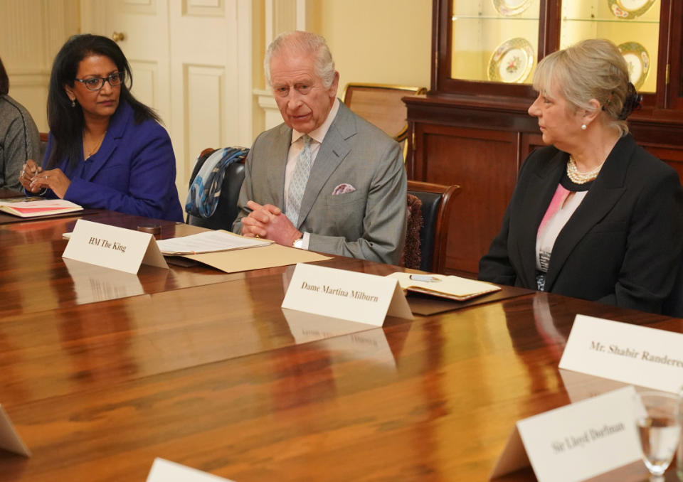 LONDON, ENGLAND - MARCH 26: King Charles III (C) speaks with Vijaya Nath (L), Dame Martina Milburn (R) and community faith leaders from across the UK who have taken part in a Windsor Leadership Trust programme, encouraging and supporting dialogue, harmony and understanding at a time of heightened international tension, during an audience at Buckingham Palace on March 26, 2024 in London, England. (Photo by Jonathan Brady - WPA Pool/Getty Images)<p>WPA Pool/Getty Images</p>