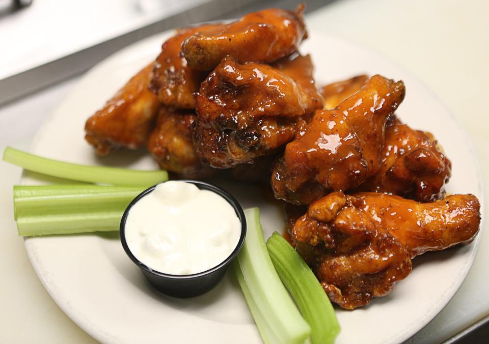 The chicken wings made by 2 Fat Guys American Grill in Hockessin have won the Delaware Wing Madness bracket challenge.