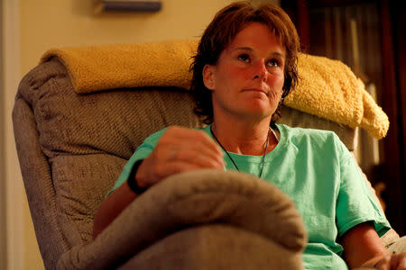 Mary McHale, a victim of sexual abuse by a member of the Catholic Church pauses during an interview with Reuters in Reading, Pennsylvania, U.S., August 18, 2018. Picture taken August 18, 2018. REUTERS/Carlos Barria