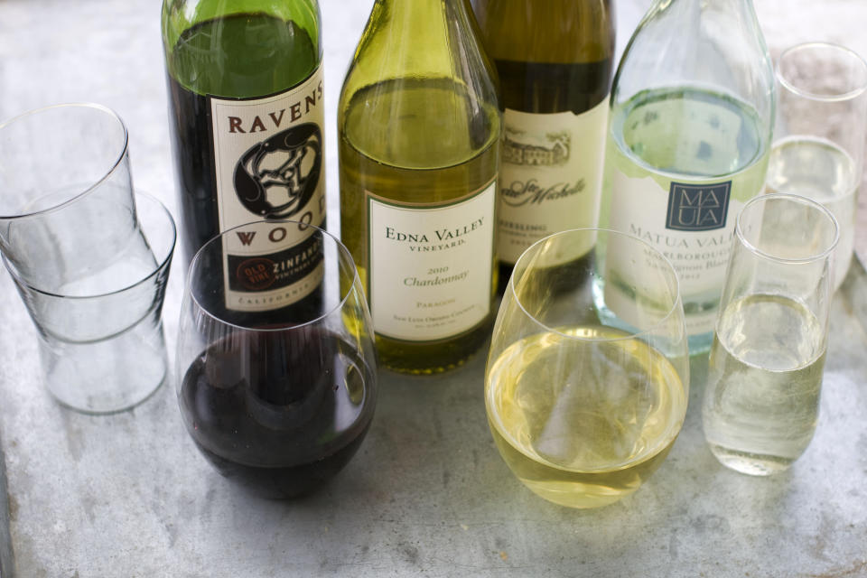 This image taken on April 29, 2013 shows, from left, Ravenswood Zinfandel, Edna Valley Chardonnay, Chateau St. Michelle Eroica Riesling and Matua Valley Sauvignon Blanc wines in Concord, N.H. (AP Photo/Matthew Mead)