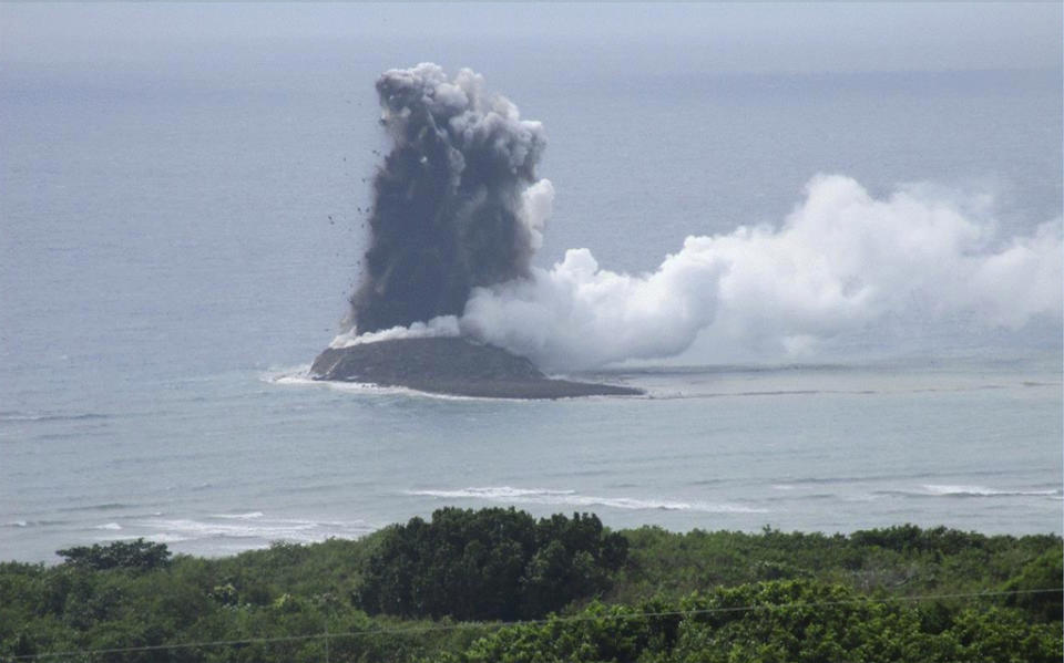 In this photo provided by the Japan Maritime Self-Defense Force, steam billows from the waters off Ioto island, Ogasawara town in the Pacific Ocean, southern Tokyo, on Nov. 1, 2023. An unnamed undersea volcano, located about 1 kilometer (half a mile) off the southern coast of Iwo Jima, which Japan calls Ioto, started its latest series of eruptions on Oct. 21. (Japan Maritime Self-Defense Force via AP)