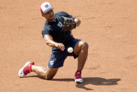 Washington Nationals' Wilmer Difo (1) as the Washington Nationals hold their first training camp work out at Nationals Stadium, Friday, July 3, 2020, in Washington. (AP Photo/Andrew Harnik)